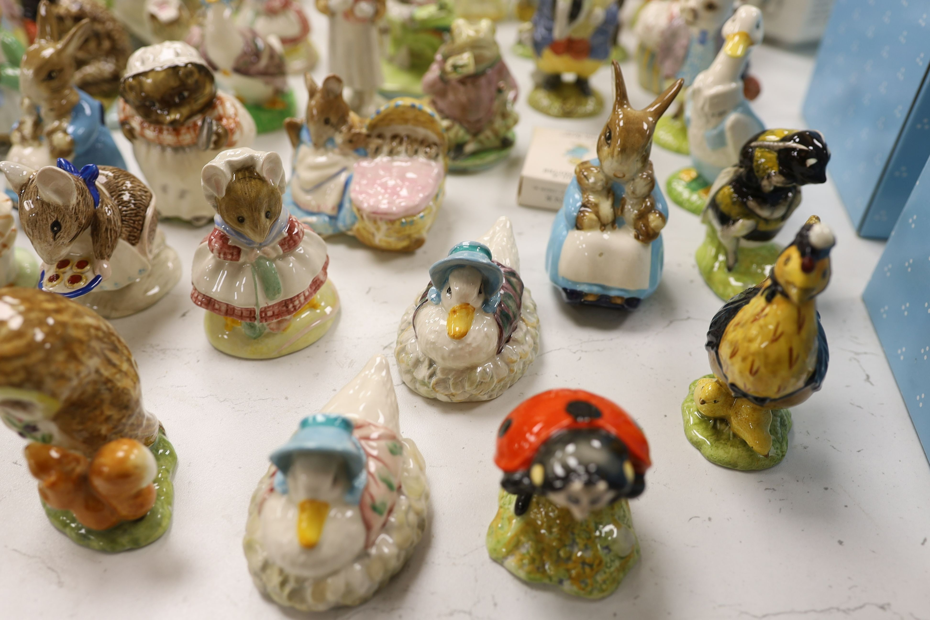 A large collection of various Beswick Beatrix Potter figures, money boxes etc.